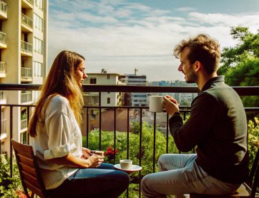 man-woman-sit-balcony-one-which-has-cup-coffee